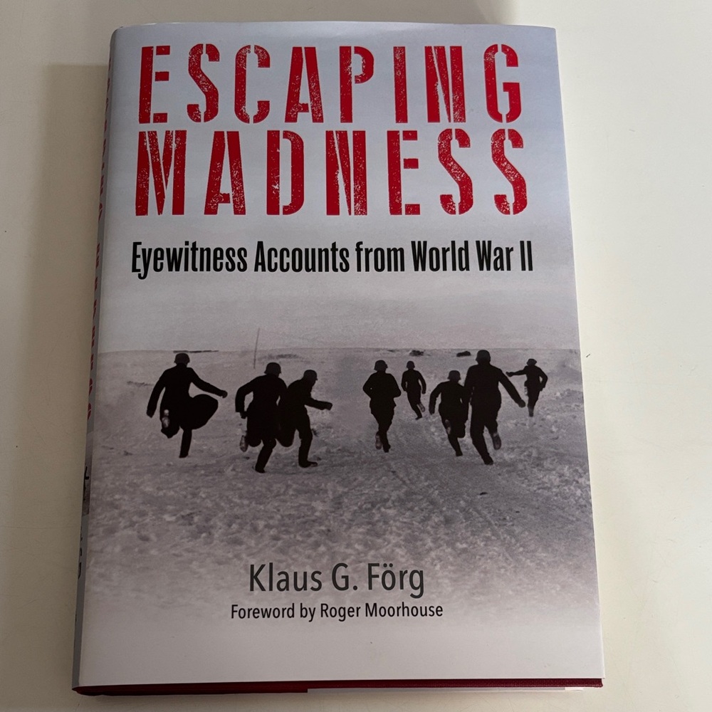 Escaping Madness: Eyewitness Accounts from World War II hardcover book